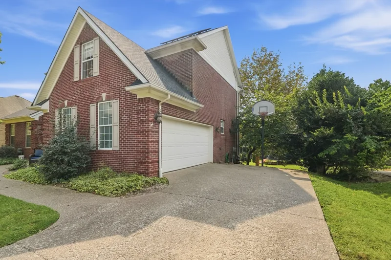 Side of the house and the two-car garage