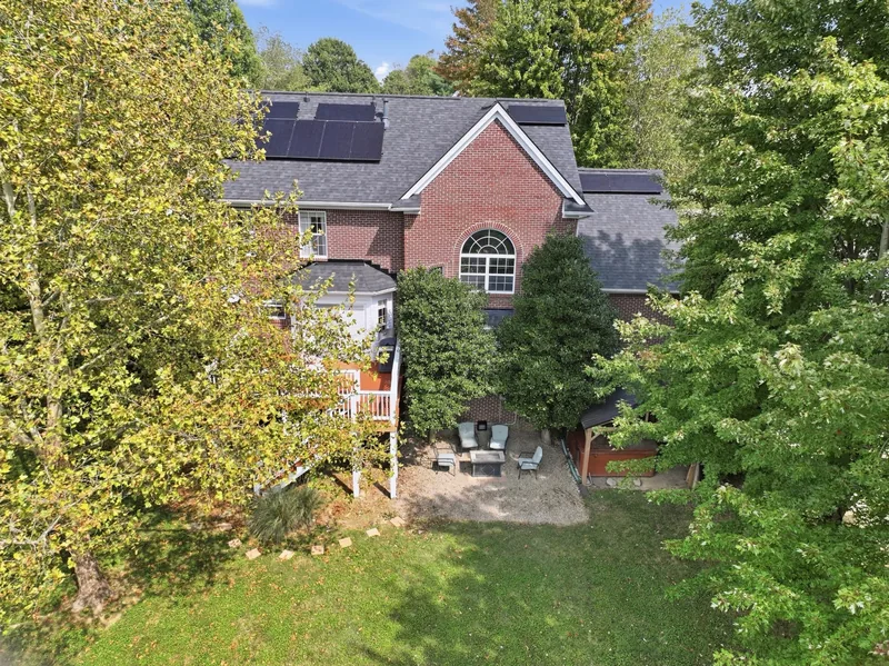 Back of the house from above, with the deck and solar panels
