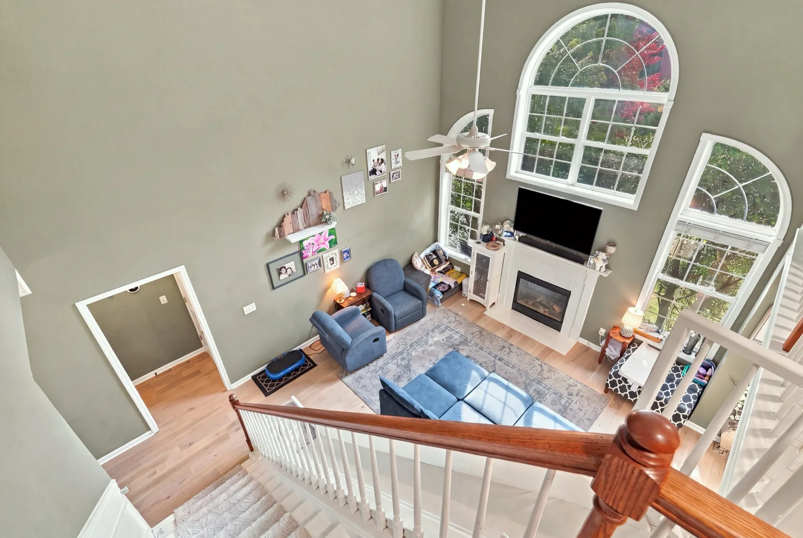 Looking down into the living room from the upstairs landing