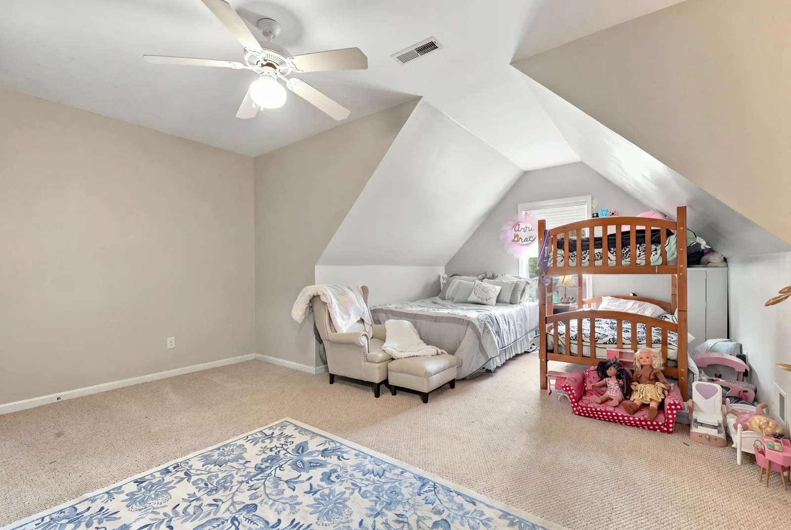 Upstairs bedroom with a dormer